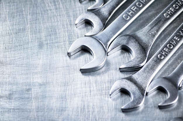 Metal wrench on the table