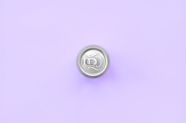 Metallic beer can on texture background of fashion pastel violet color paper in minimal concept