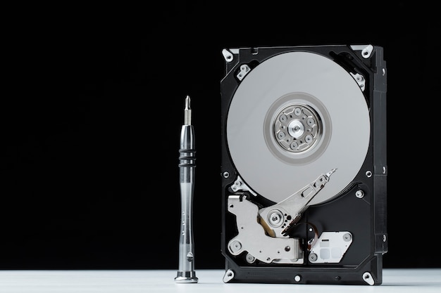 Photo metallic hard disk components with dark background