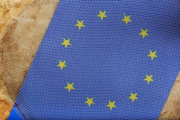 Metallic net on a flag of the European Union. Top view