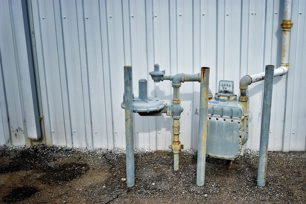 Photo metallic pipes outside house