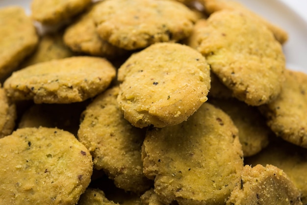 Methi Mathri is a Rajasthani Indian tea time snack and a type of flaky biscuit.