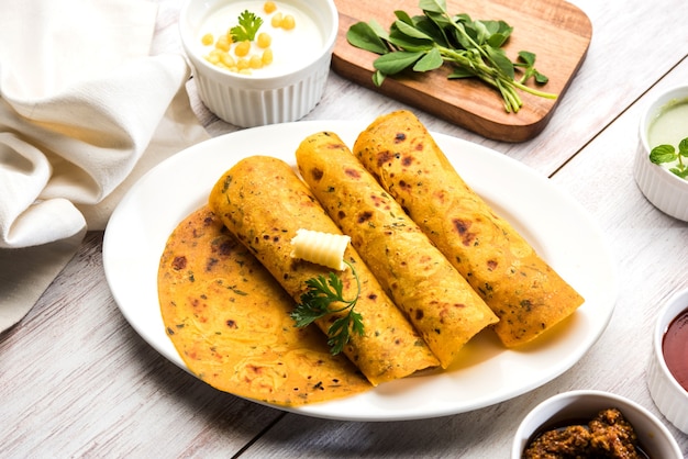 Methi Paratha or Thepla is an Indian flat bread made using fenugreek leaves, selective focus