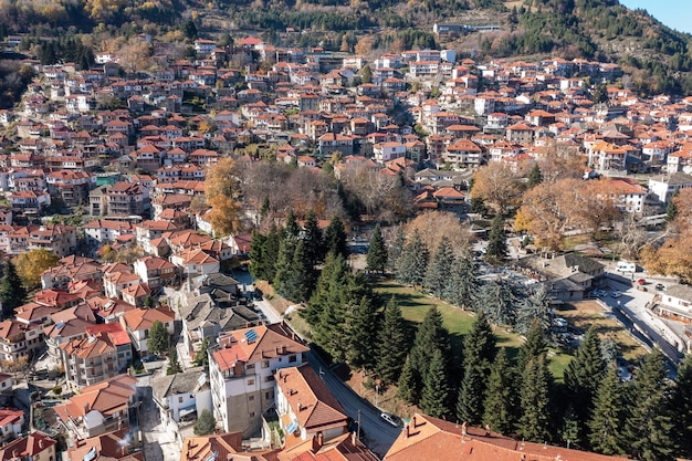 Metsovo village Epirus Greece Aerial drone view of traditional red tile roof house on the mountain