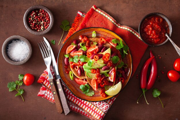 Mexican avocado bean sandwich with tomato chili scallion