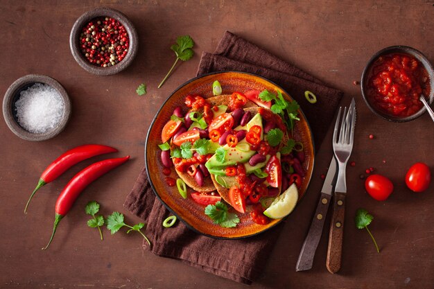 Mexican avocado bean sandwich with tomato chili scallion