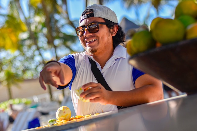 Mexican barman detail close up shot with selective focus