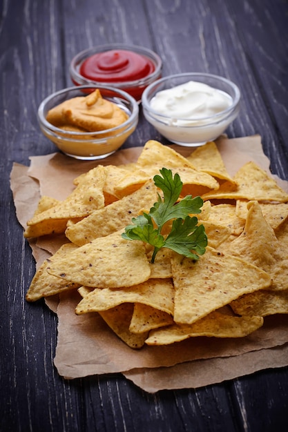 Mexican corn chips nachos with sauce