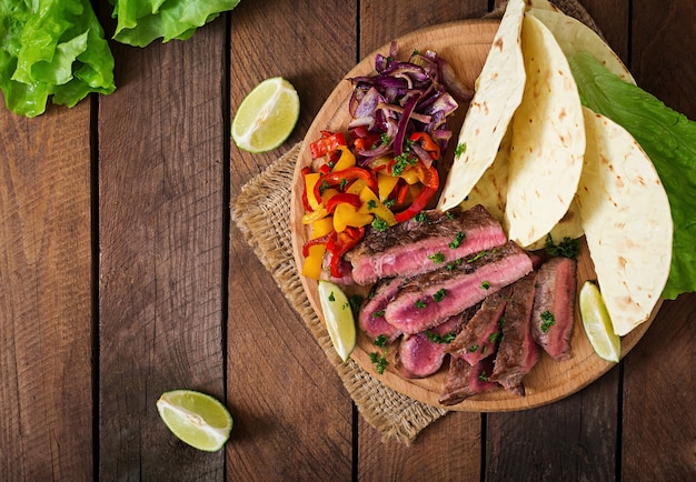 Mexican fajitas for beef steak and grilled vegetables