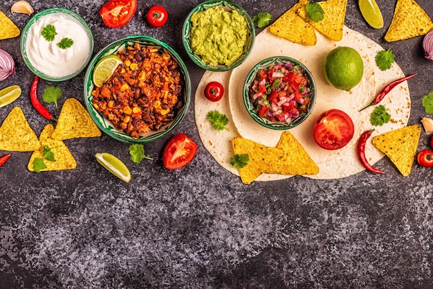 Mexican food background guacamole salsa cheesy sauces