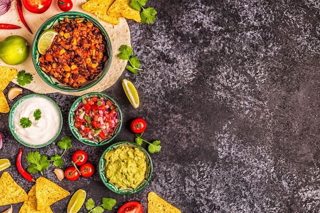 Mexican food background guacamole salsa cheesy sauces