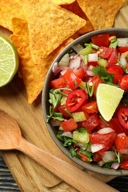 Mexican food concept with Pico de Gallo on wooden table