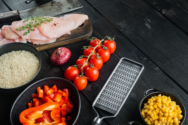 Mexican food. Cuisine of South America. Traditional ingredients, on black wooden table background with copy space for text