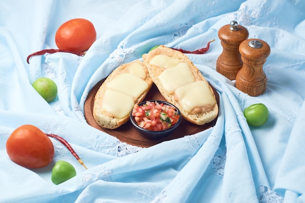 Mexican molletes in wooden plate