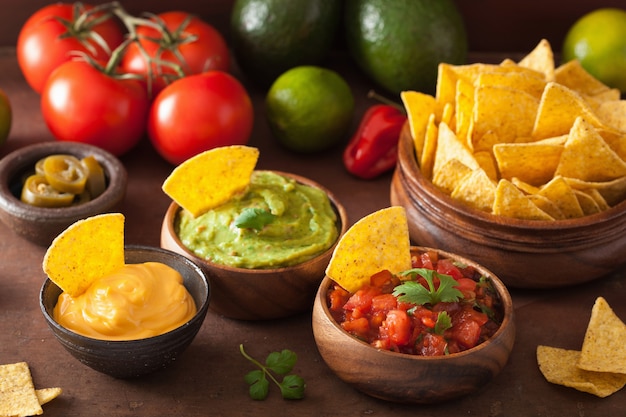 Mexican nachos tortilla chips with guacamole and salsa dip