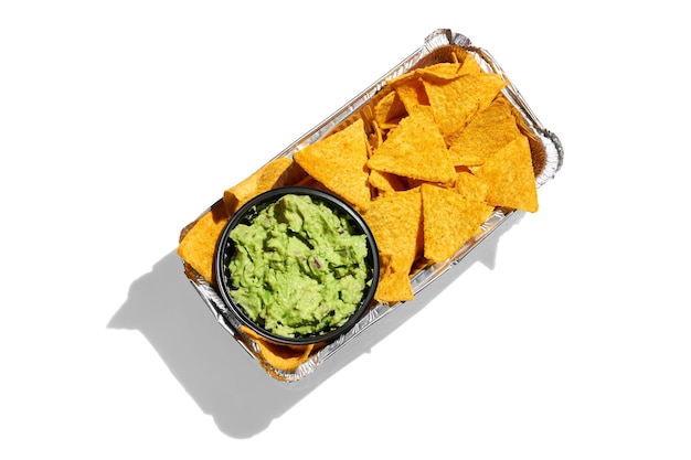 Mexican nachos with avocado guacamole on a white background Hard Light