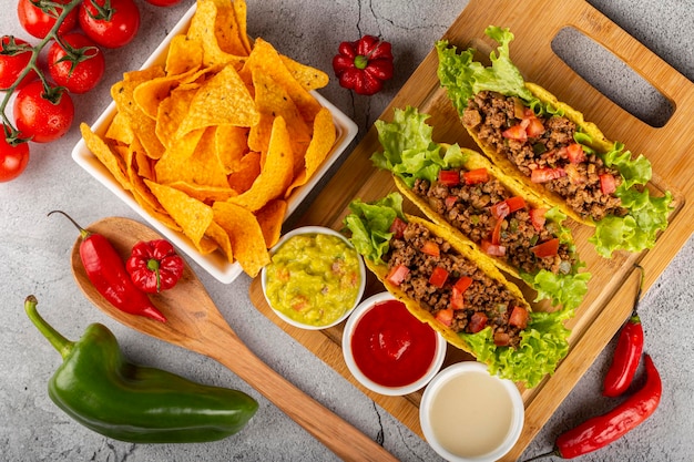 Mexican tacos with lettuce beef and tomatoes