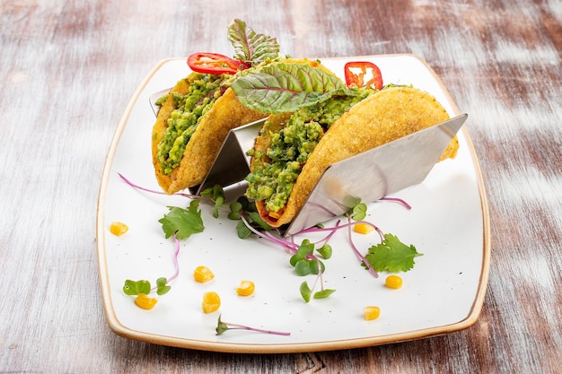 Mexican tacos With pork pepper and guacomole Mexican traditional dish