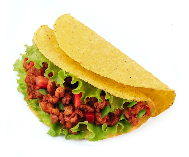 Photo mexican tacos with vegetables on white backgrounds.