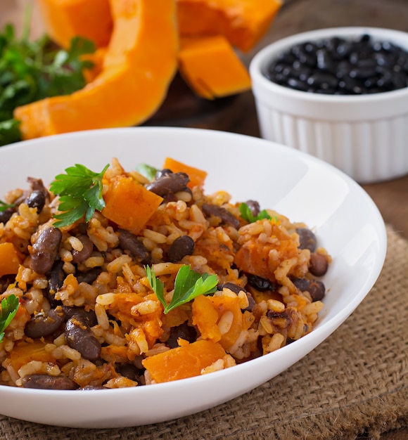 Mexican vegan vegetable pilaf with haricot beans and pumpkin