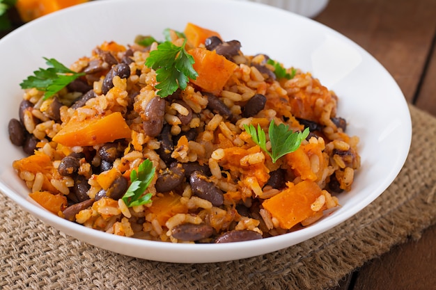 Mexican vegan vegetable pilaf with haricot beans and pumpkin