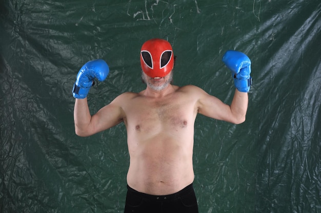 mexican wrestler in red mask