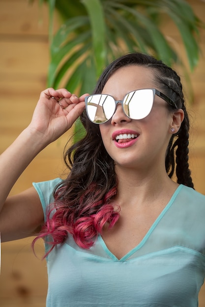 Mexican young woman summer portrait wearing sun glasses