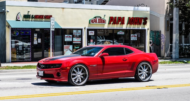 Miami beach florida usa april red chevrolet camaro ss muscle car side view
