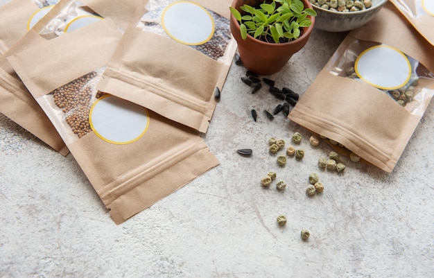 Photo microgreen seeds in paper bags and equipment for sowing microgreens