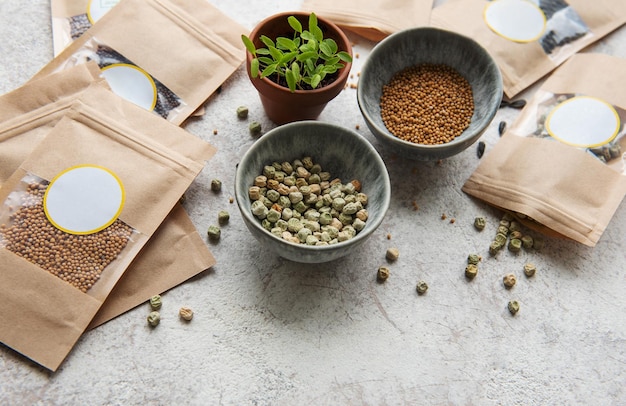 Microgreen seeds in paper bags and equipment for sowing microgreens