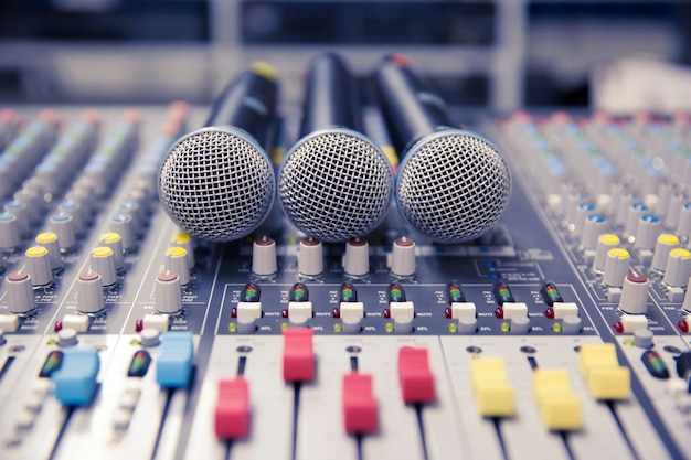 Microphone and Audio Mixer in Studio.