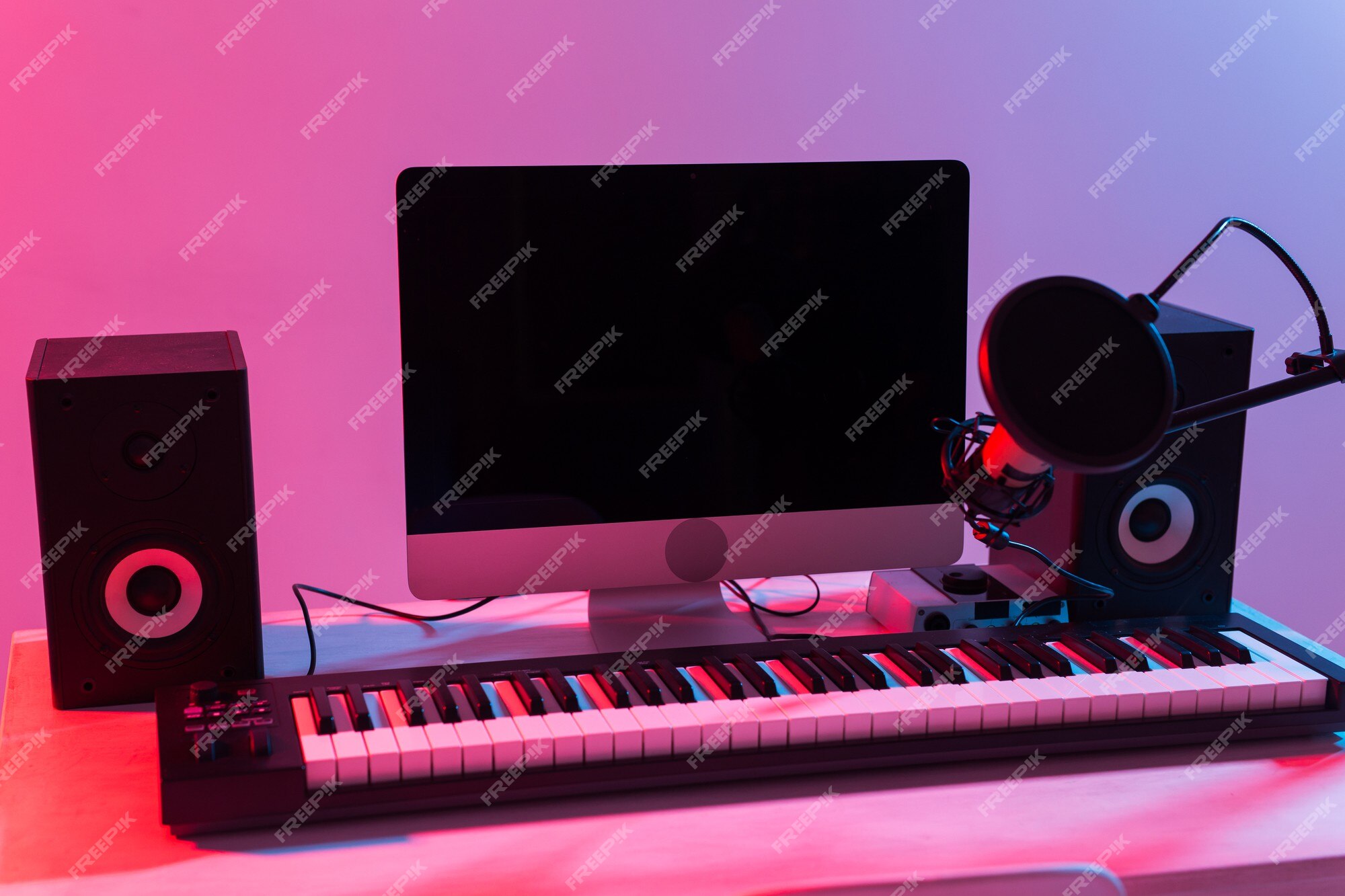 Music studio full of instruments and pc display Stock Photo - Alamy