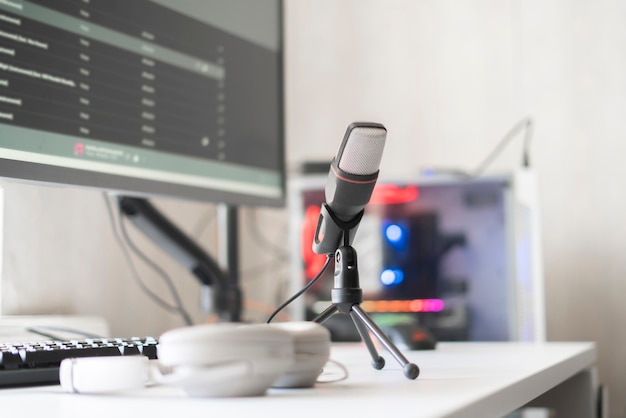 The microphone and computer in the radio studio, recording speach live