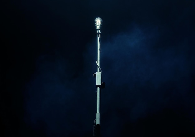 Microphone on dark background music instrument concept