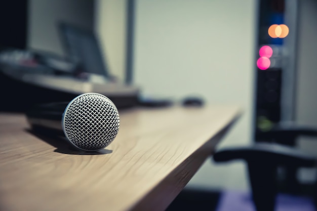 Microphone is placed on the table with laptop at Control room.