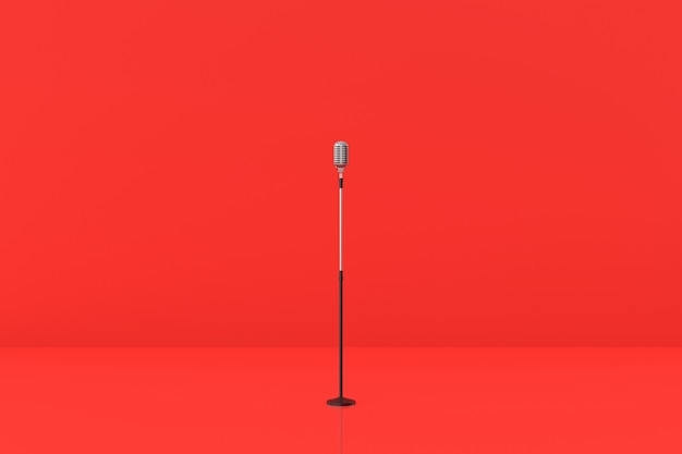 Фото Модель микрофона на красном фоне. 3d-рендеринг.