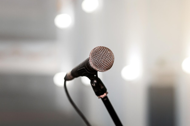 A microphone on stage in a concert hall or american bar restaurant during a show