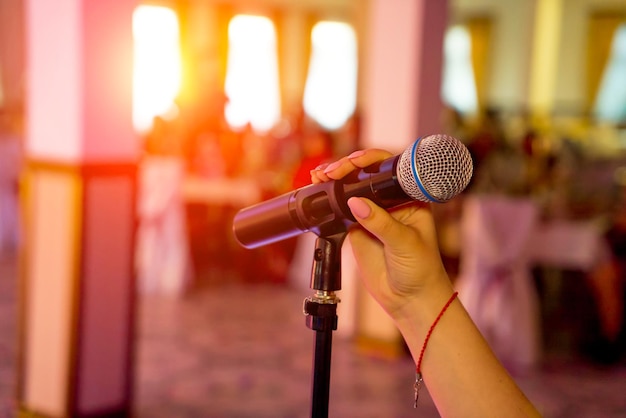 Microphone on stage microphone closeup microphone a pub bar a\
restaurant classical evening night show restaurant