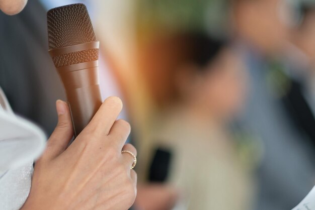 Microphone on stage, speaker, conference