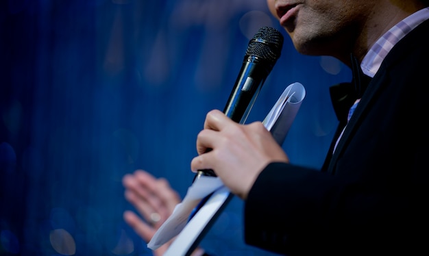 Microphone on stage, speaker, conference