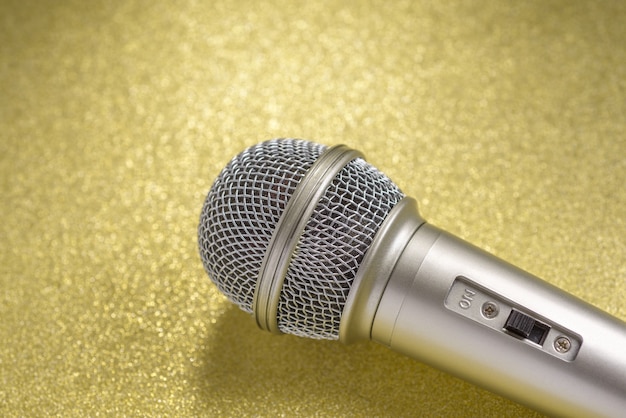 Microphone on a yellow background..