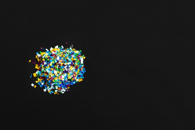 Microplastic on black background 