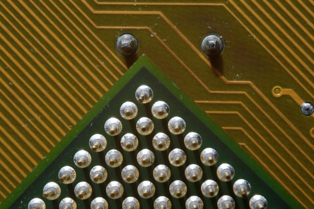 Microprocessor on the background of the microcircuit of the motherboard