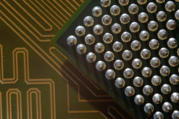 Microprocessor on the background of the microcircuit of the motherboard