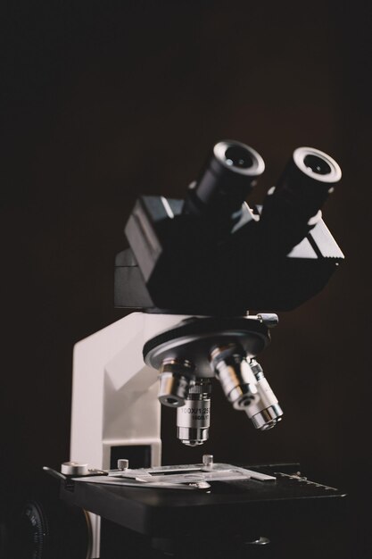 Photo microscope in laboratory science closeup research laboratory of biology by biotechnology for analysis experiment education and test