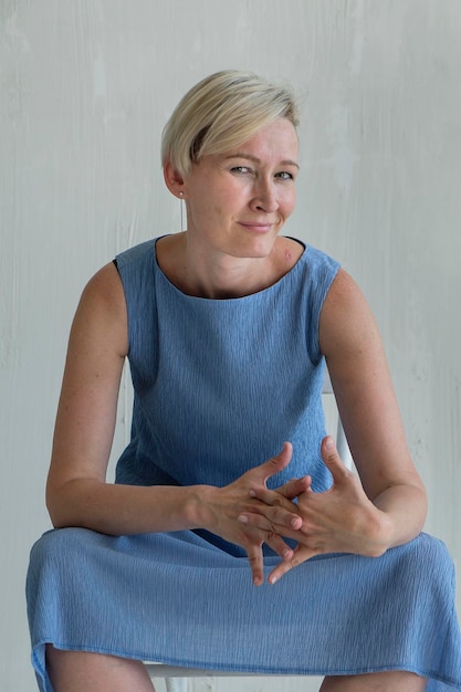 mid adult woman posing emotion in studio