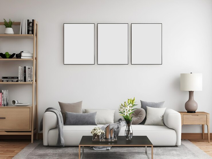 Mid-century mockup room with 3empty frames, 2 white sofa and pillows, table lamp, table, and wooden