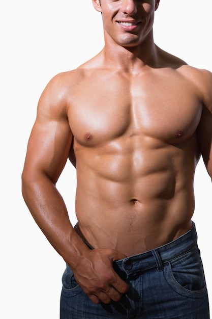 Mid section of a shirtless muscular man