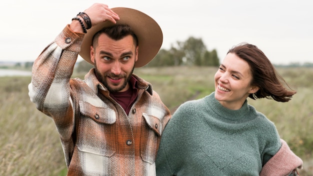 Mid shot couple laughing