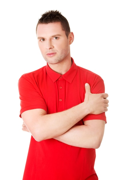 Foto middenvolwassen man met een rood t-shirt op een witte achtergrond